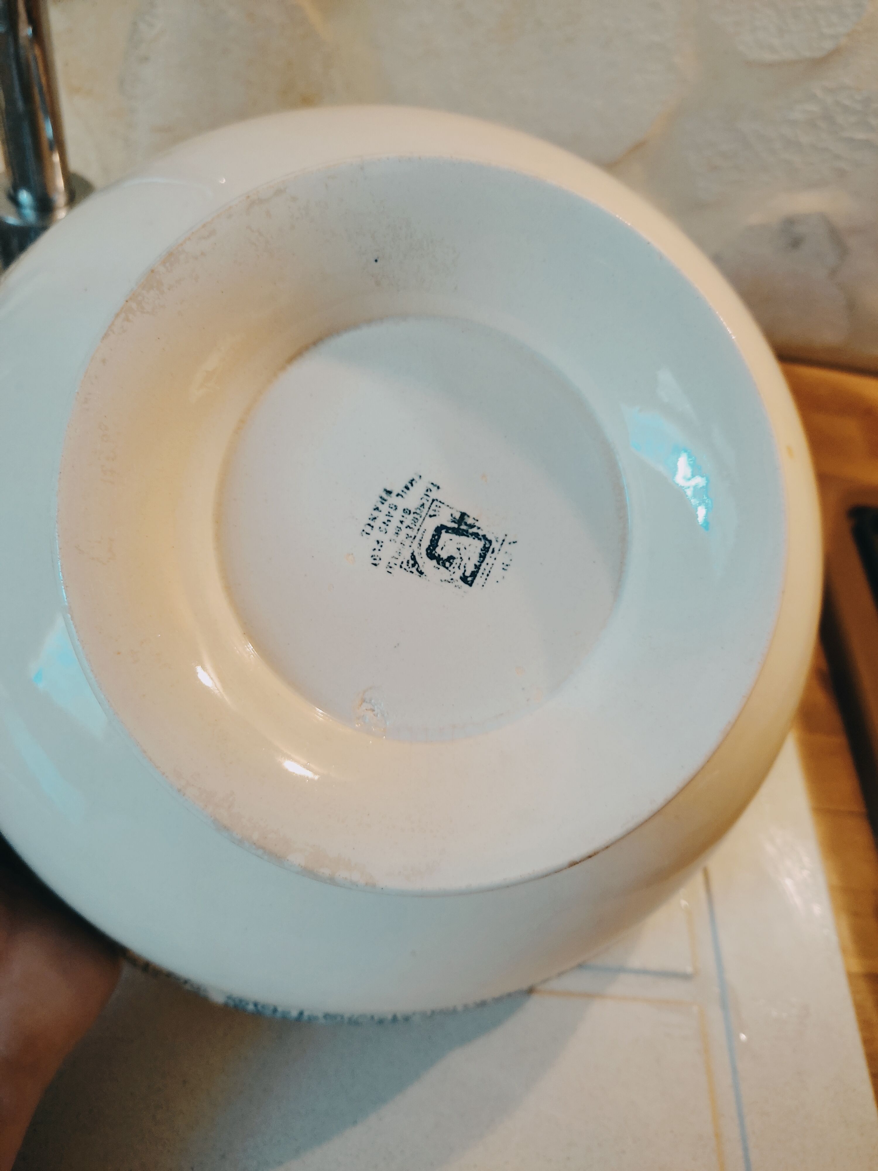 Old bowl in pedestic tiles