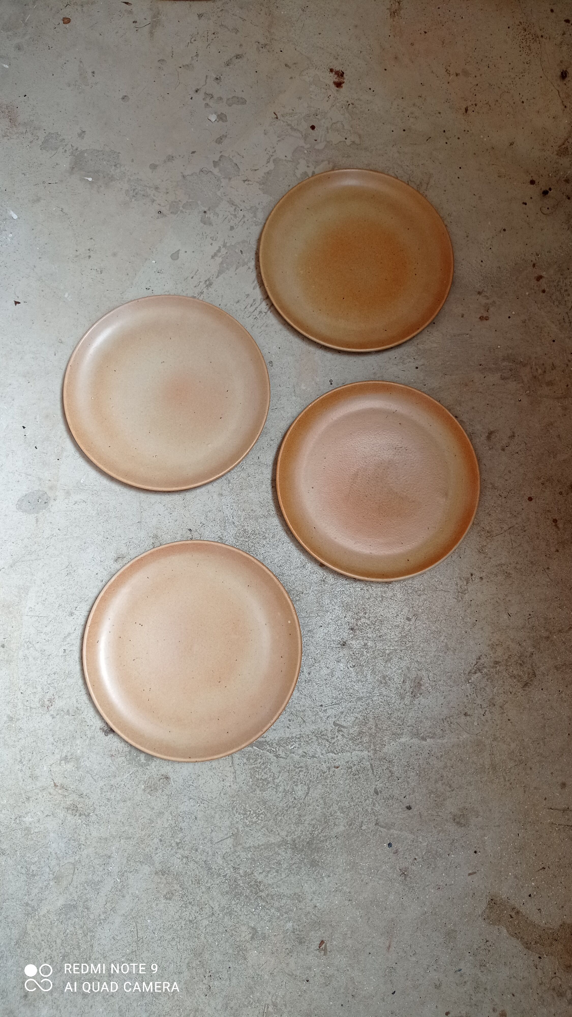 Set of four plates in sandstone