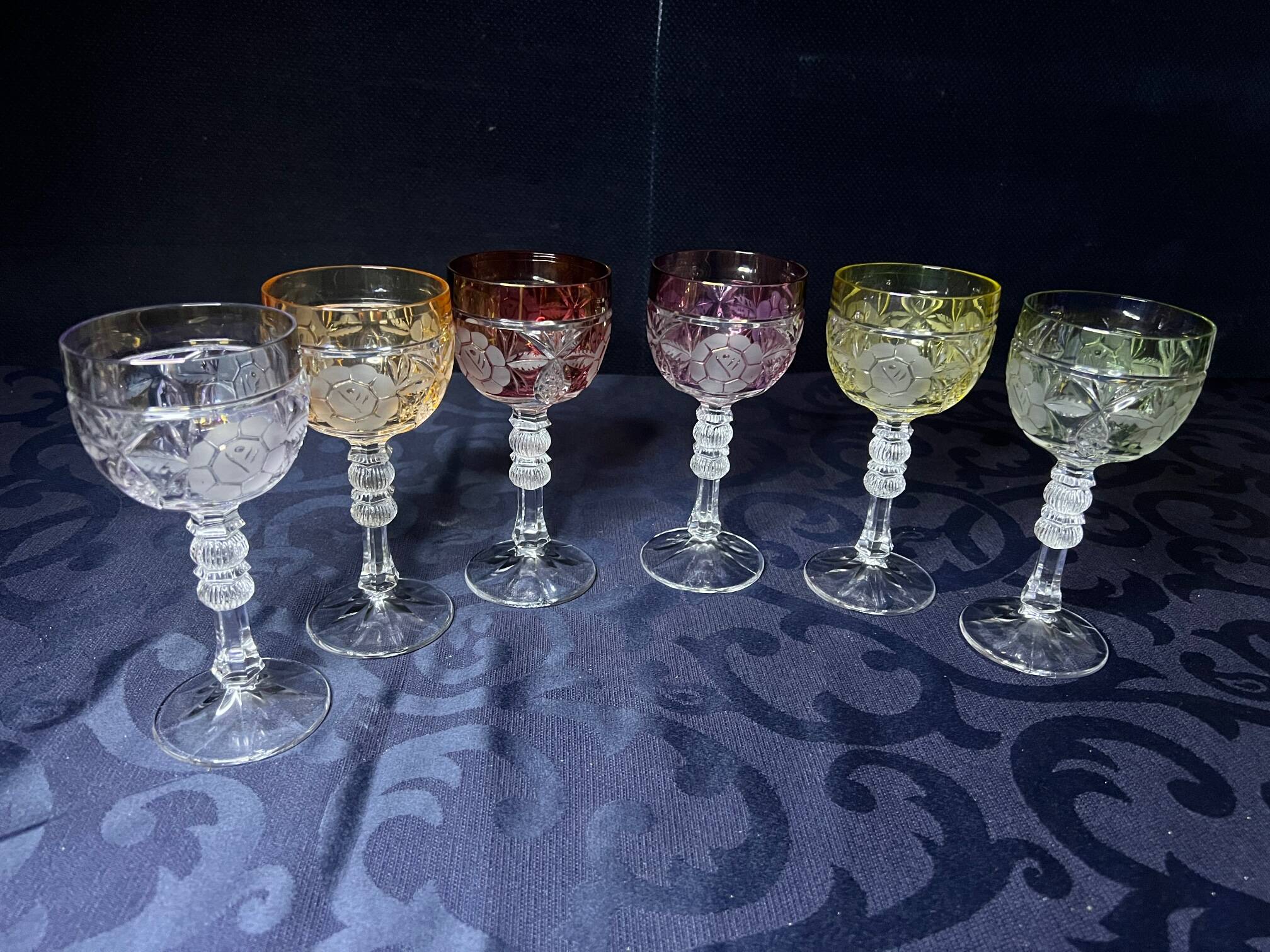 Set of 6 wine glasses. Solid colored crystal.