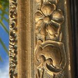 Miroir en bois et stuc doré