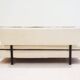 Italian modernist daybed with white upholstery and iron frame.