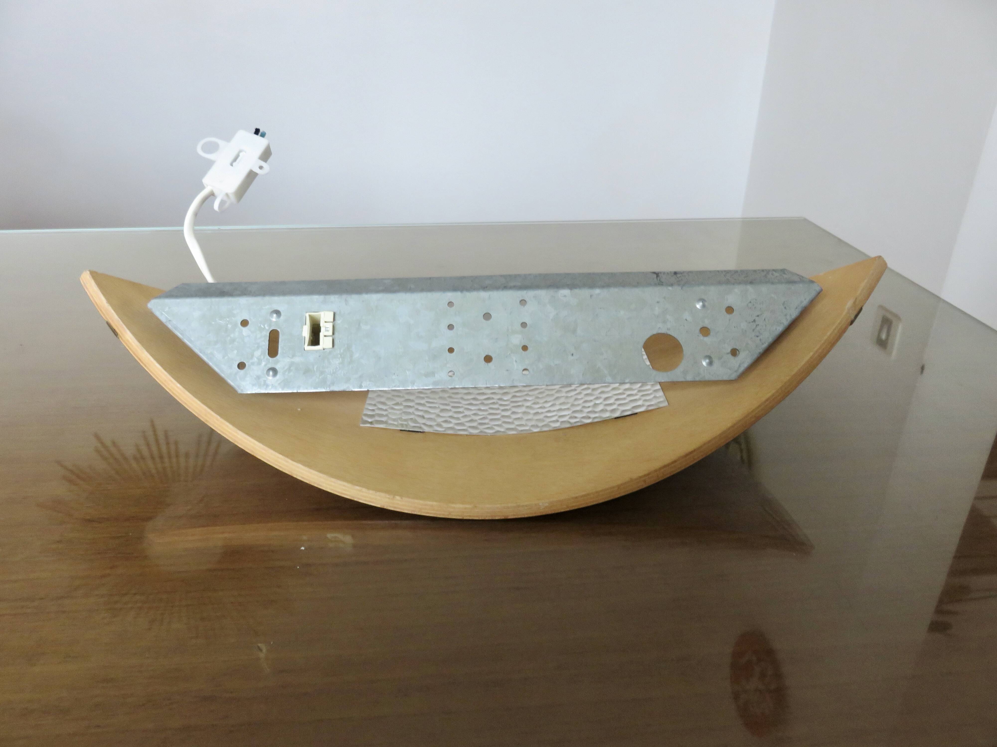 Pair of Scandinavian wall lights in bent wood with brass accents, 1980.