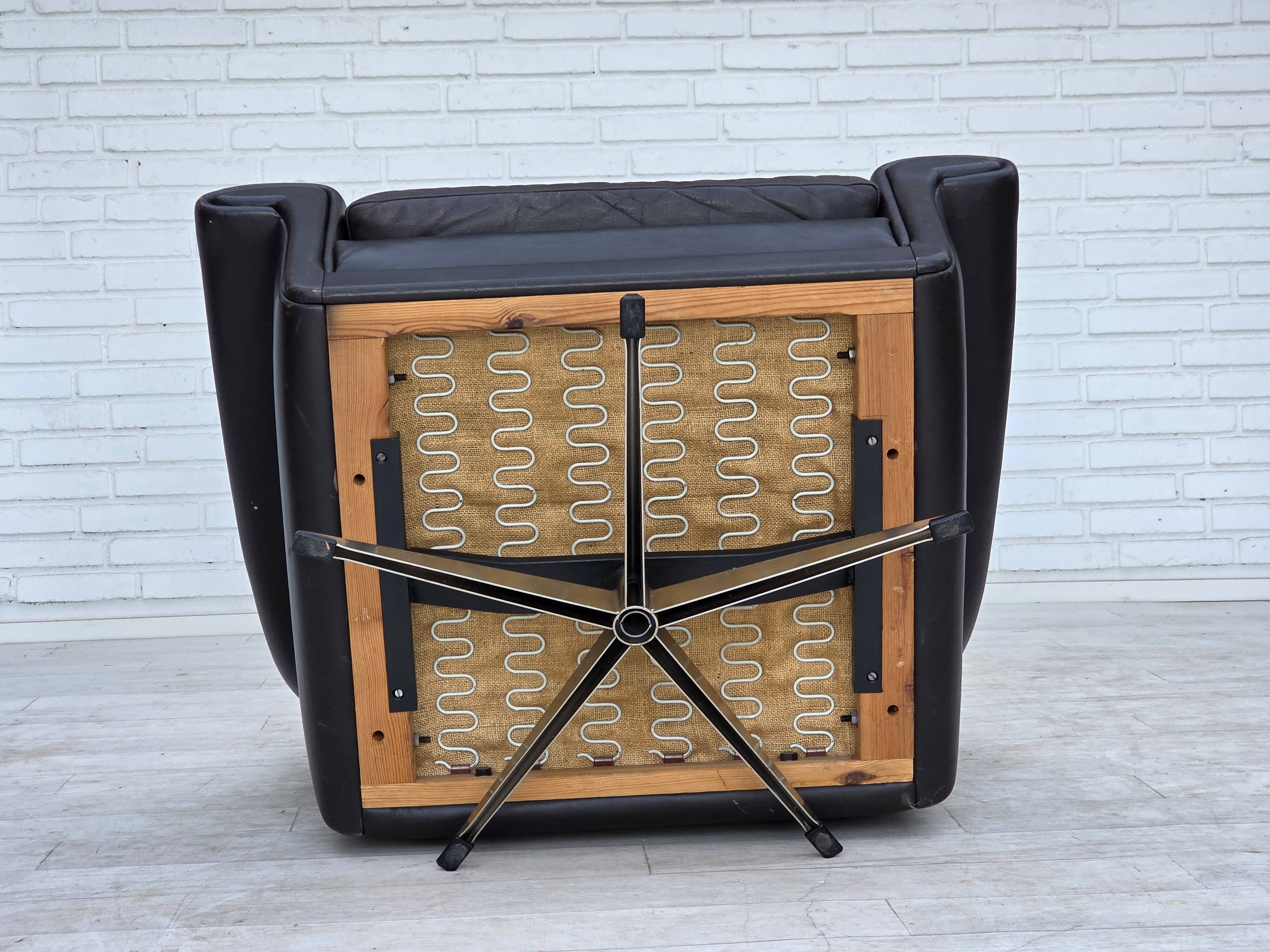 1960s, Danish highback swivel armchair by Aage Christensen, leather.