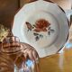 Vintage bell and its Digoin plate