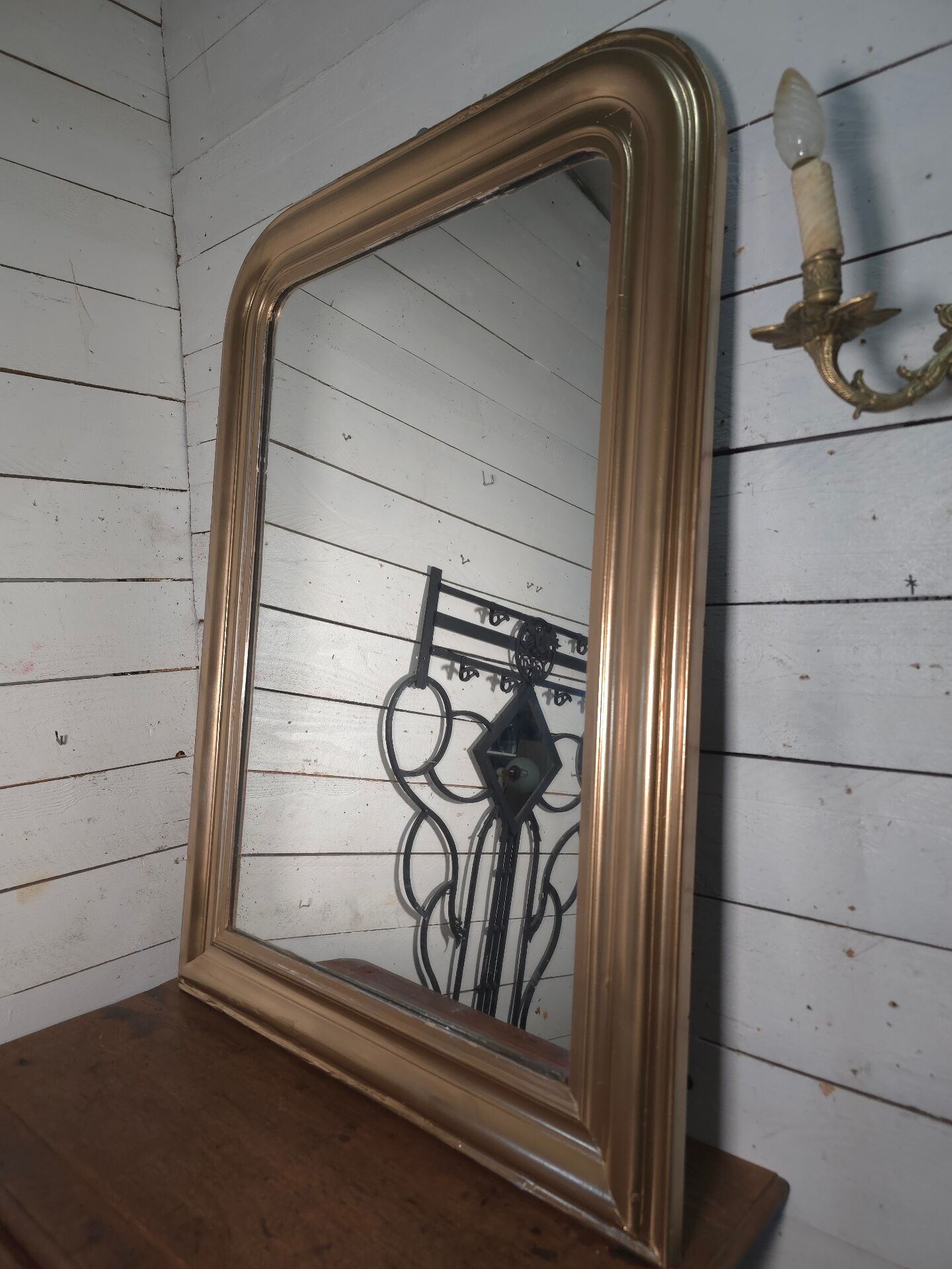 Golden mirror in Louis Philippe style