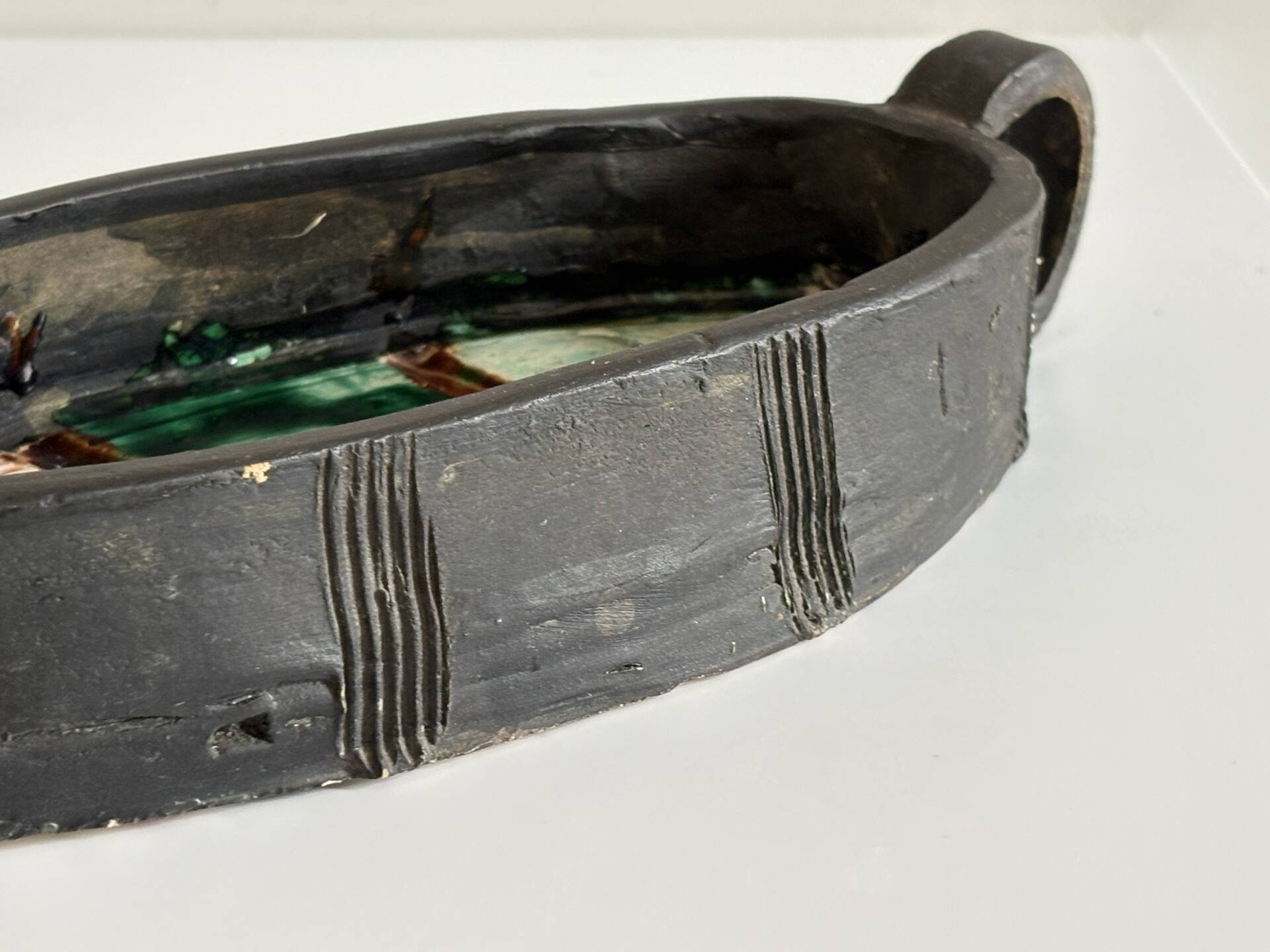 Oval bowl with two handles in glazed ceramic, 1970-71