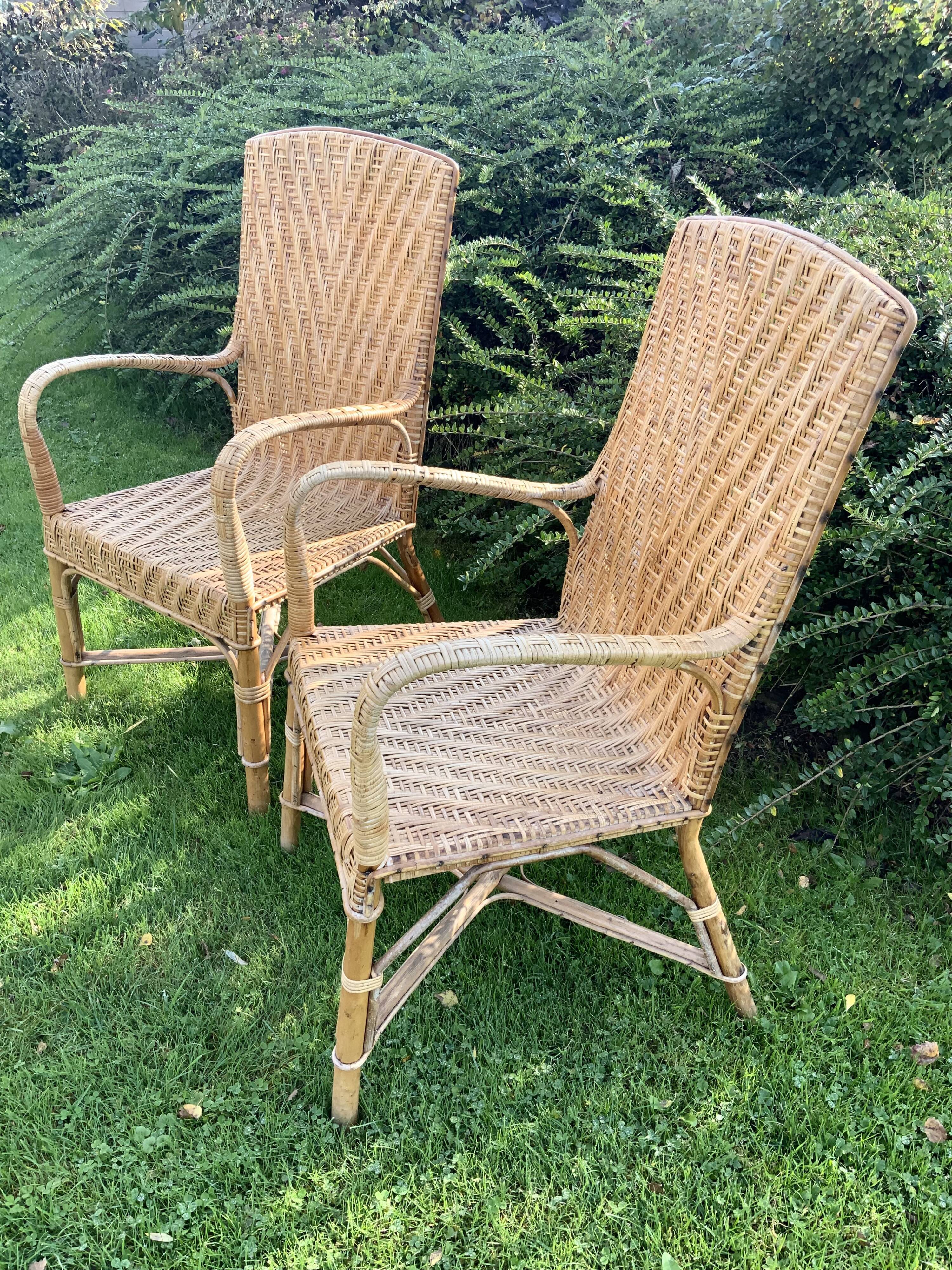 Pair of old wicker rattan chairs