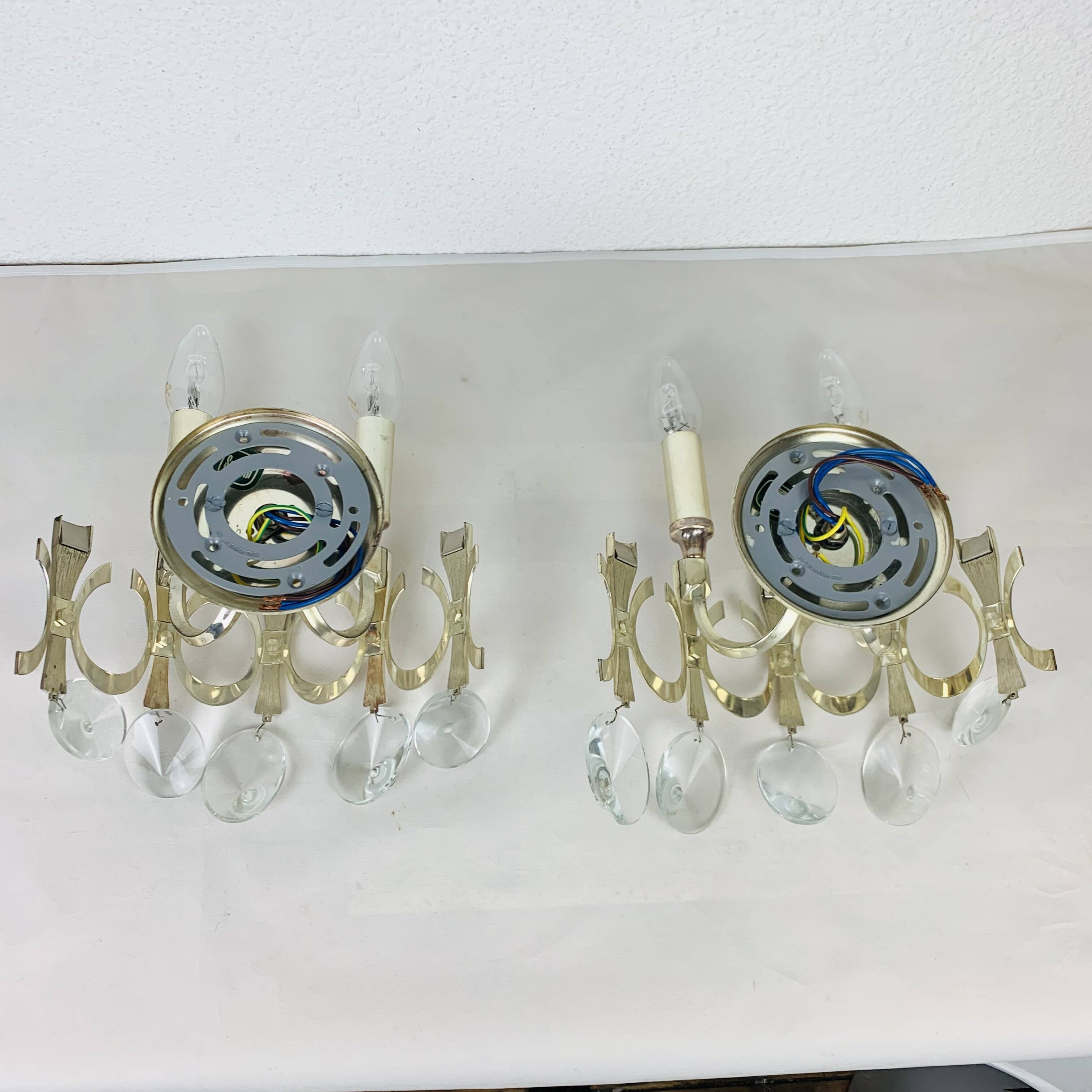 Pair of Ovali wall lights by Sciolari 70s