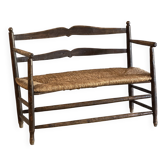 Banc ancien en chêne et paille
