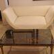 Low table in bronze and glass eglomisé