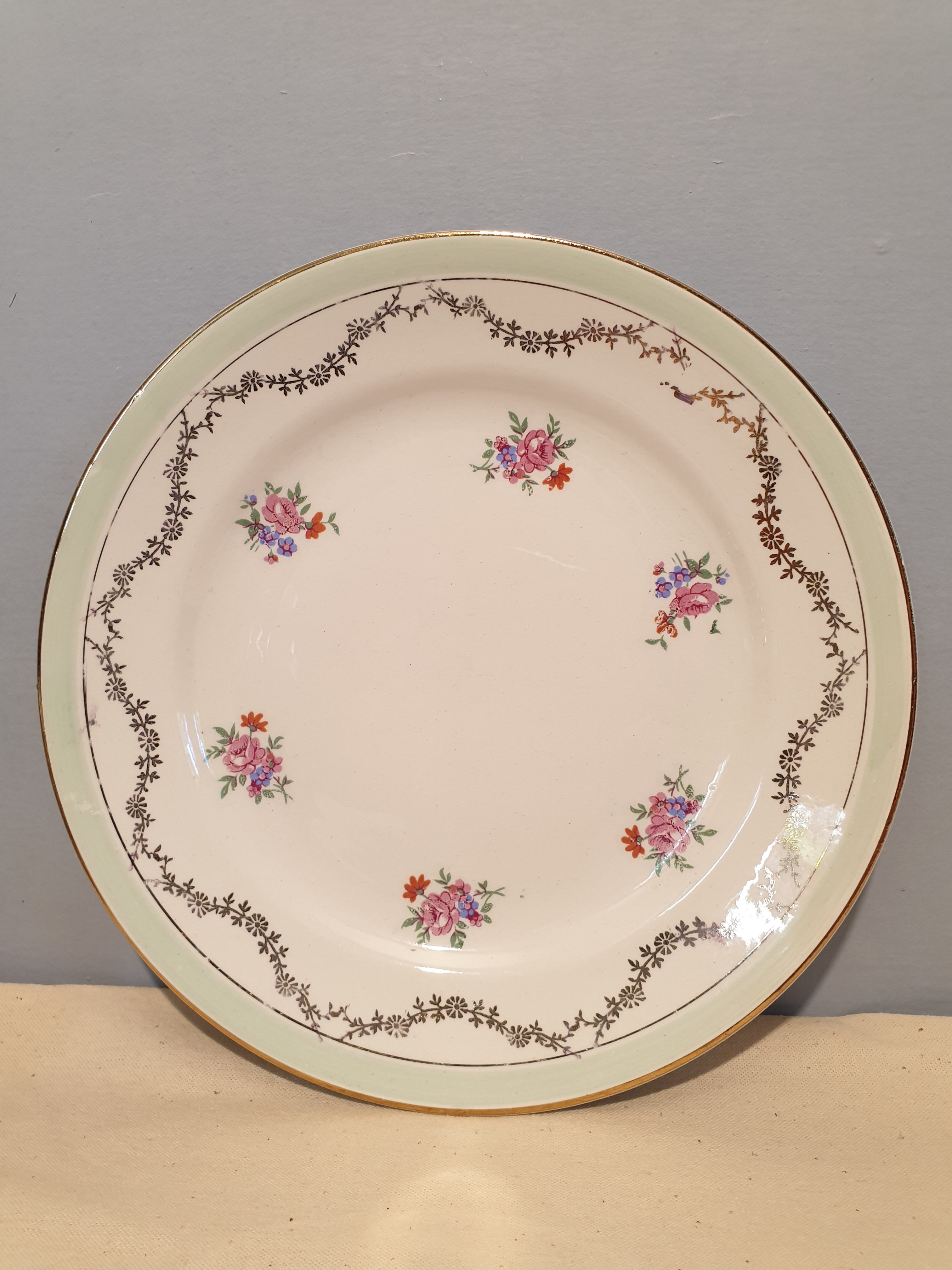 Suite of 11 St Amandinoise dessert plates