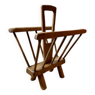 Brutalist magazine rack in the style of Jean Touret, 1950s.