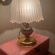 Vintage table lamp in brass and pleated opaline glass.