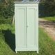 Parisian wardrobe in vintage green wood
