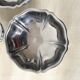 Low stainless steel cups with scalloped edges