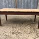 Rustic antique farmhouse table in solid cherry wood.