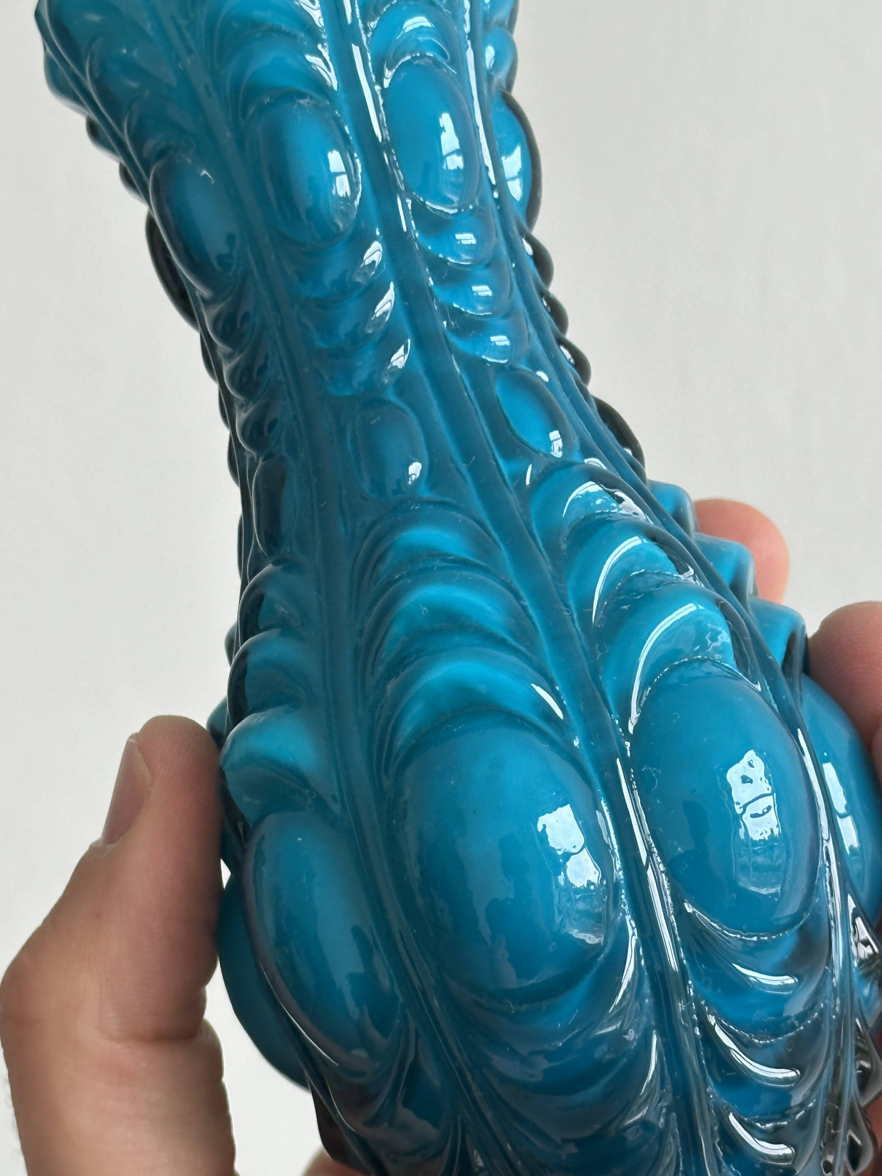Small deep blue vase with reliefs