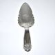 Vintage silver-plated pie server with rose decoration.