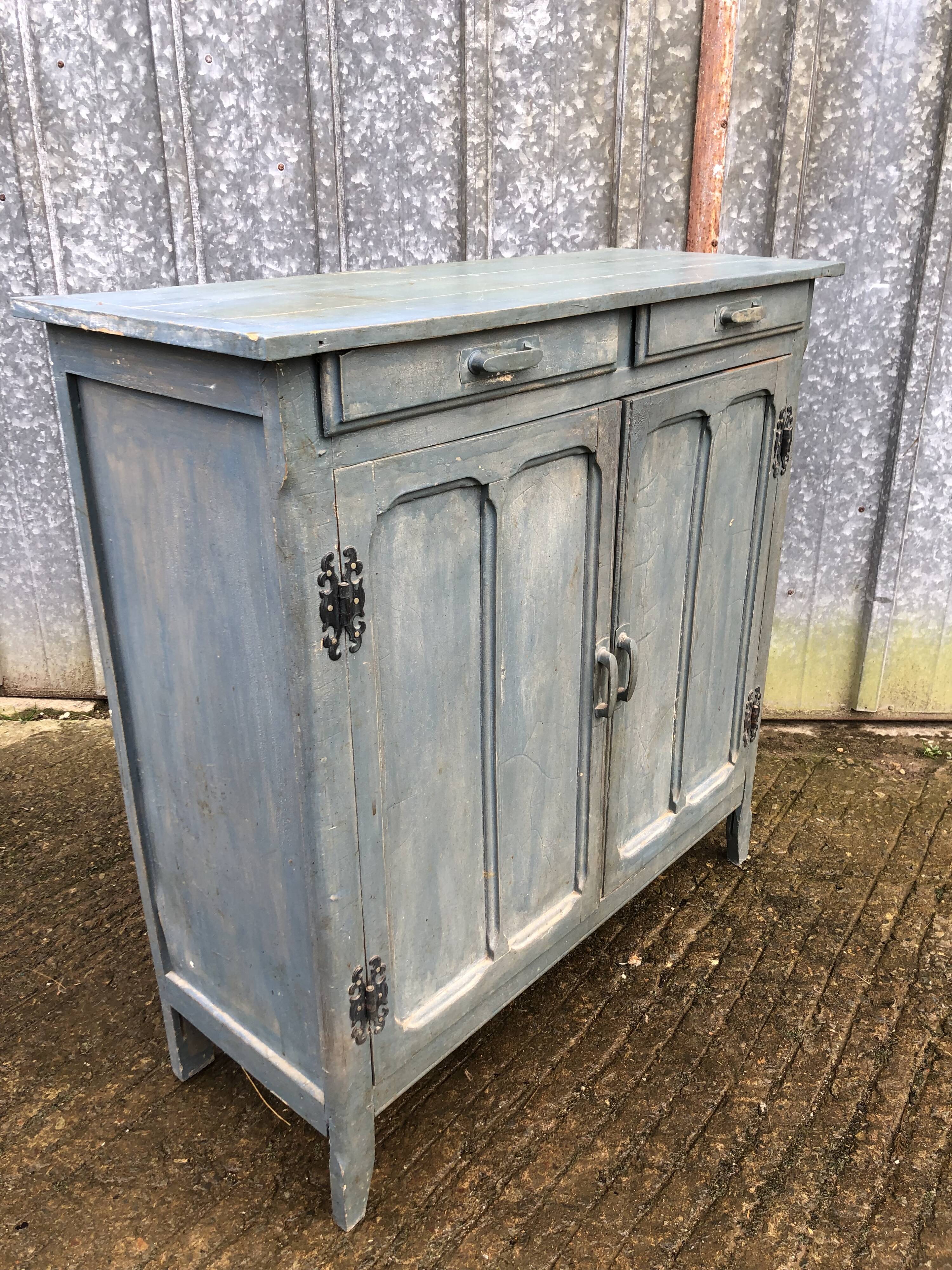 Parisian sideboard painted in blue with 2 doors and 2 drawers.