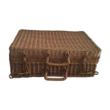 Wicker suitcase.