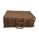 Wicker suitcase.