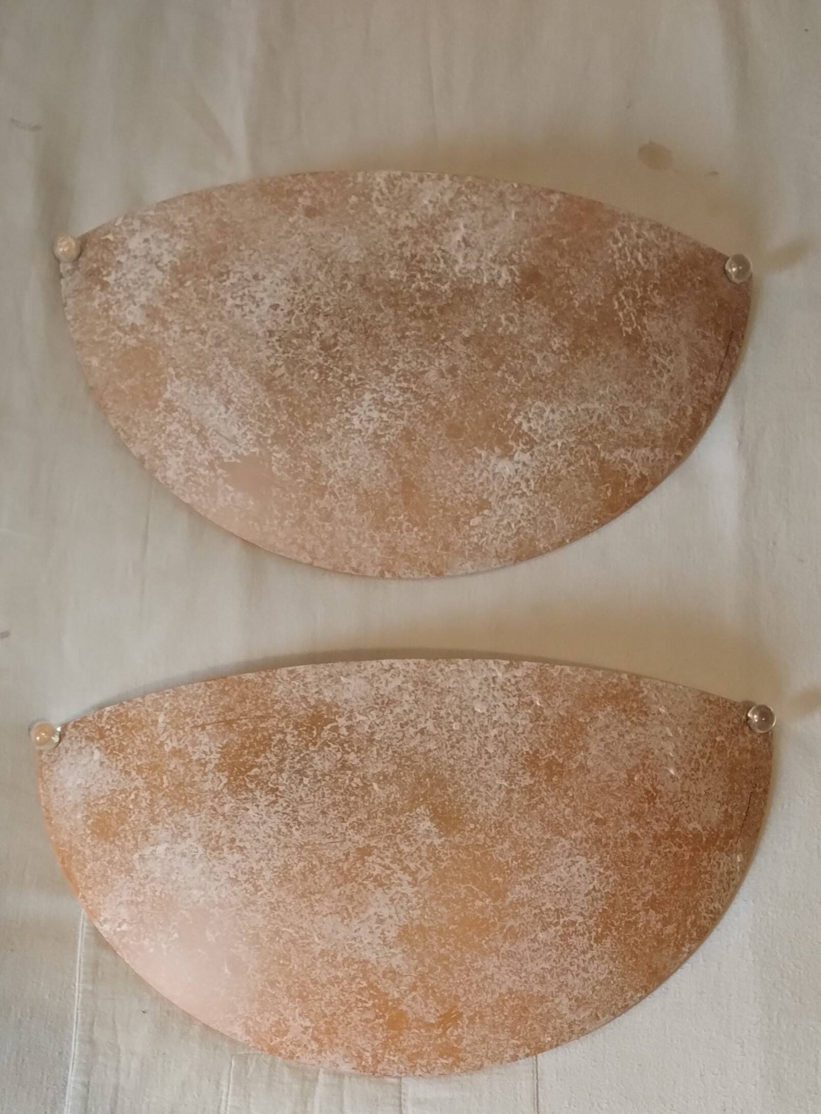 Pair of wall sconces signed L. Drummer