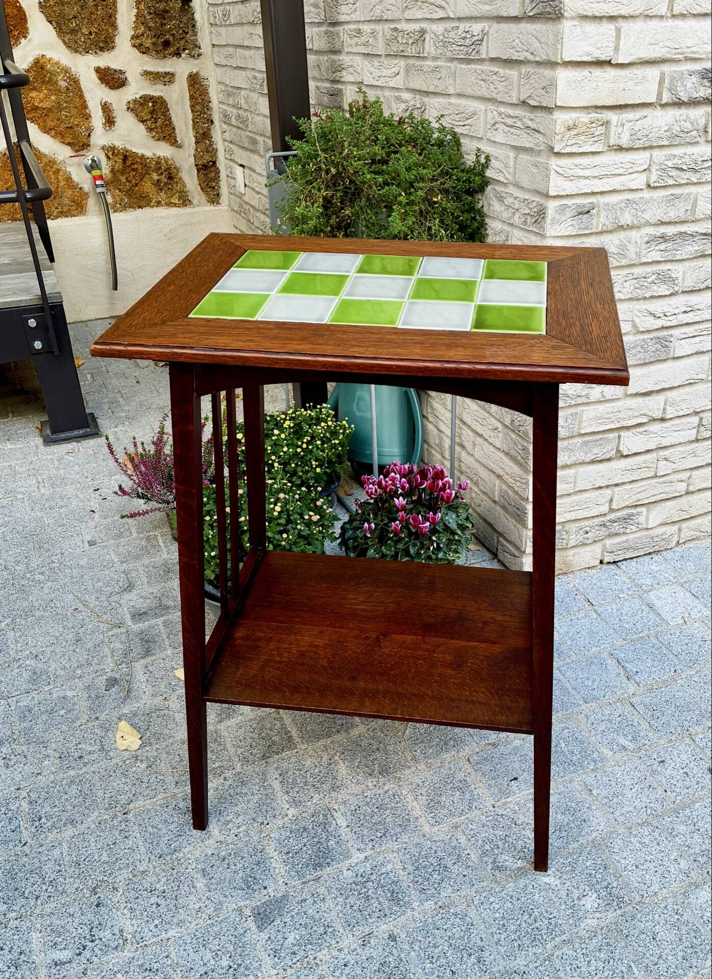 Art Nouveau side table 1910 with double tops in dark oak.