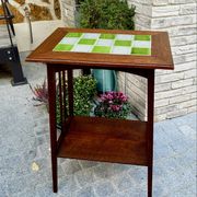 Art Nouveau side table 1910 with double tops in dark oak.
