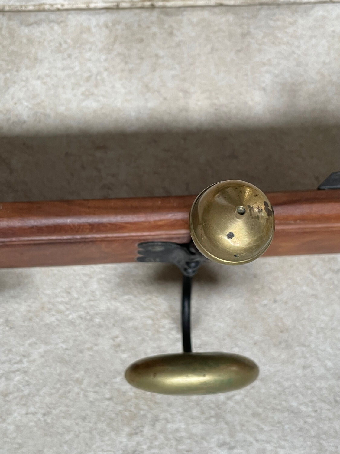 Wood and brass coat rack