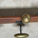Wood and brass coat rack