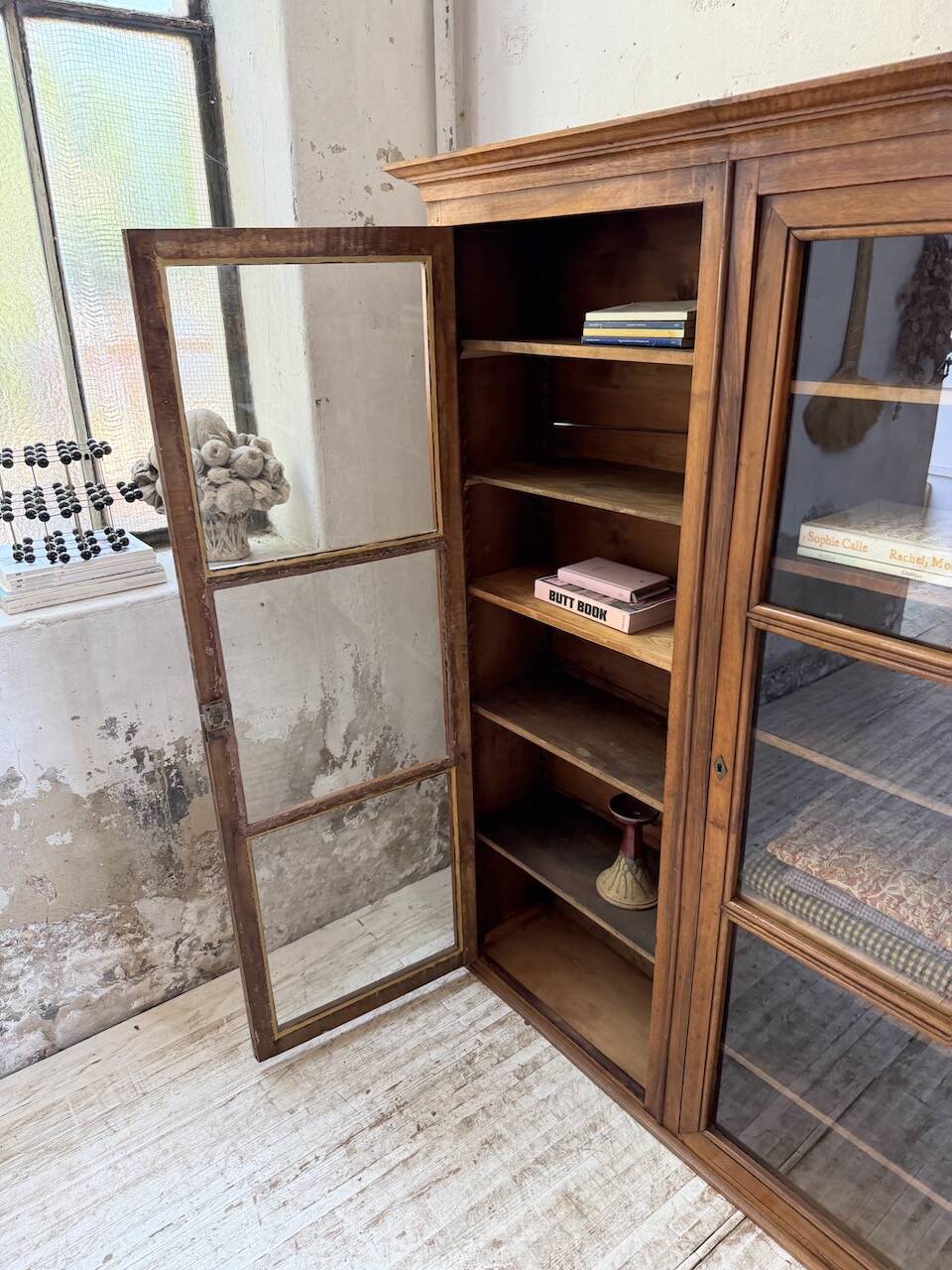 Glass-fronted walnut library 1900