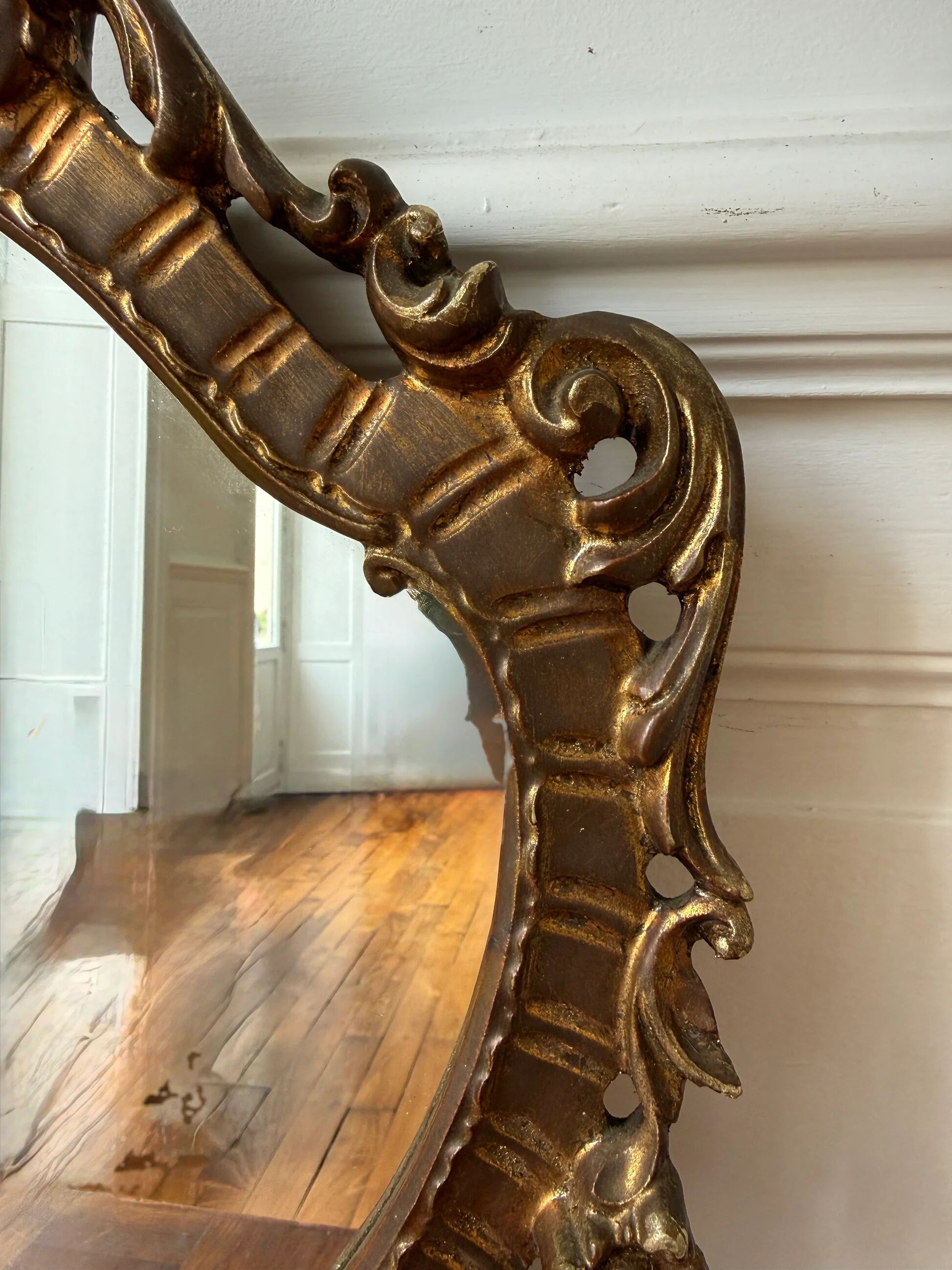Golden rococo wall mirror