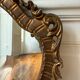Golden rococo wall mirror