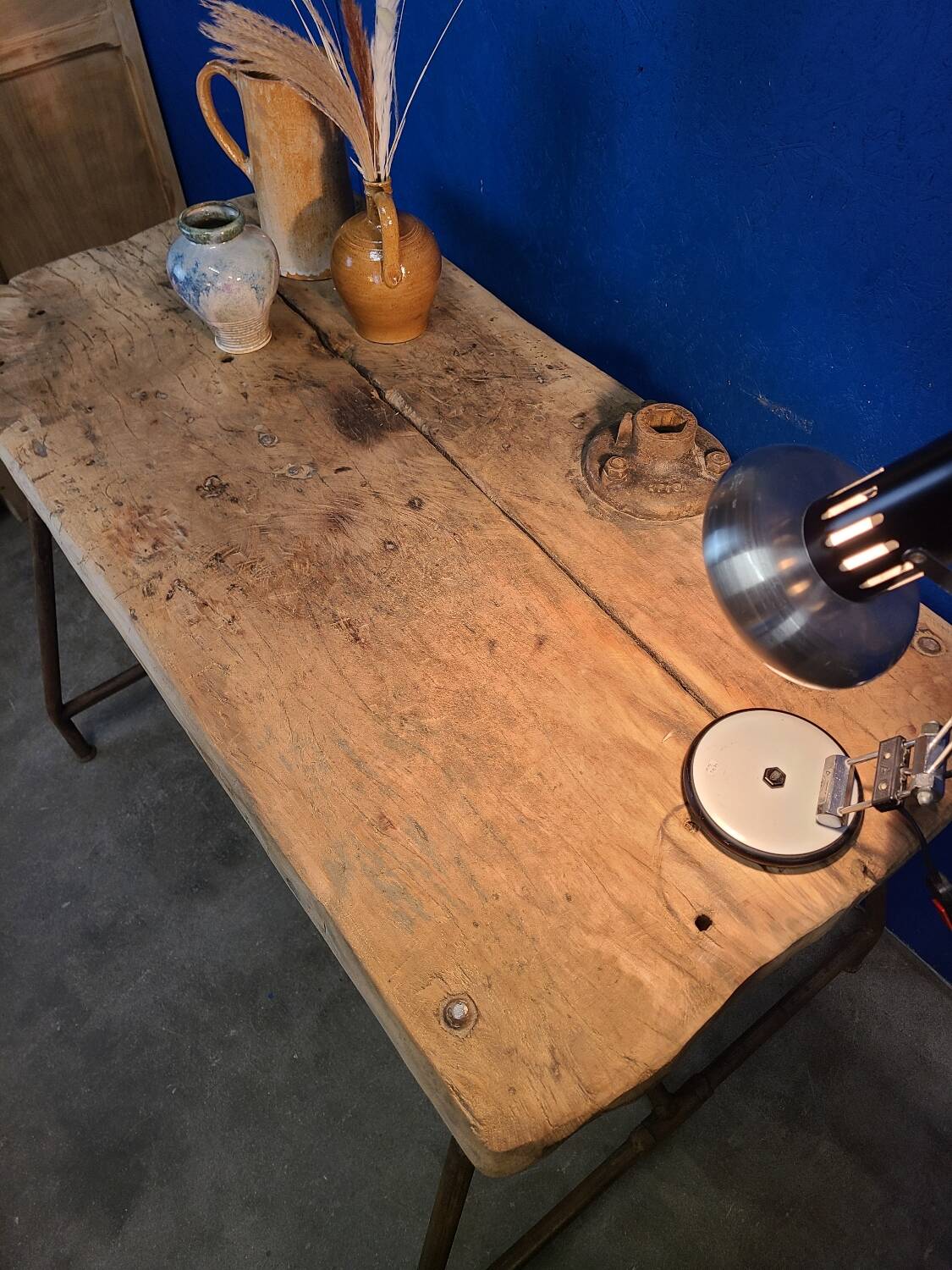 Vintage workbench circa 1930, folding metal leg.