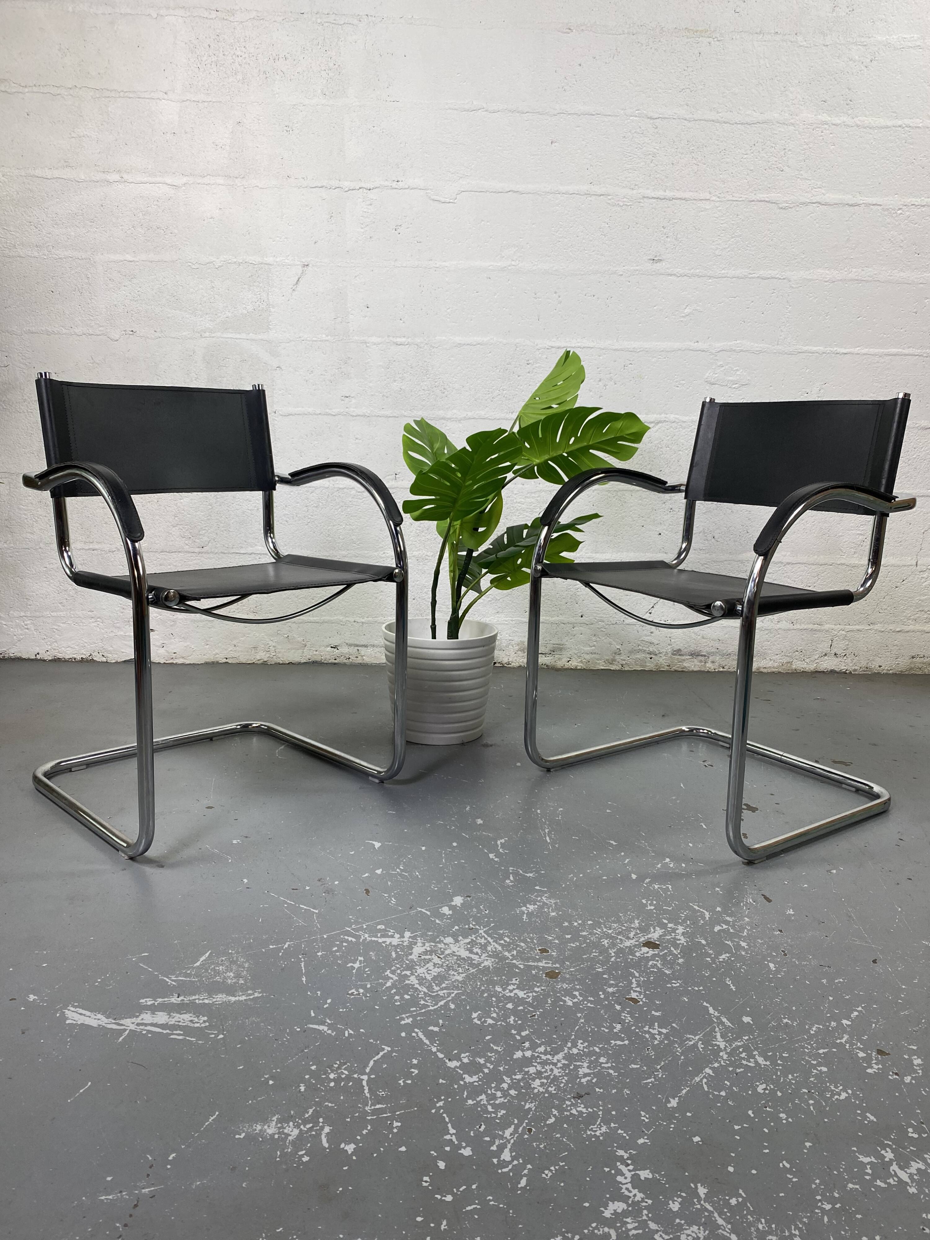 Pair of design armchairs in imitation leather chrome