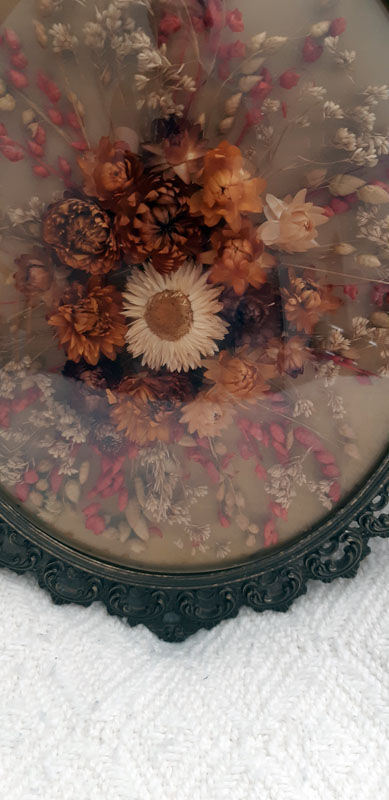 Herbier ovale vintage en laiton