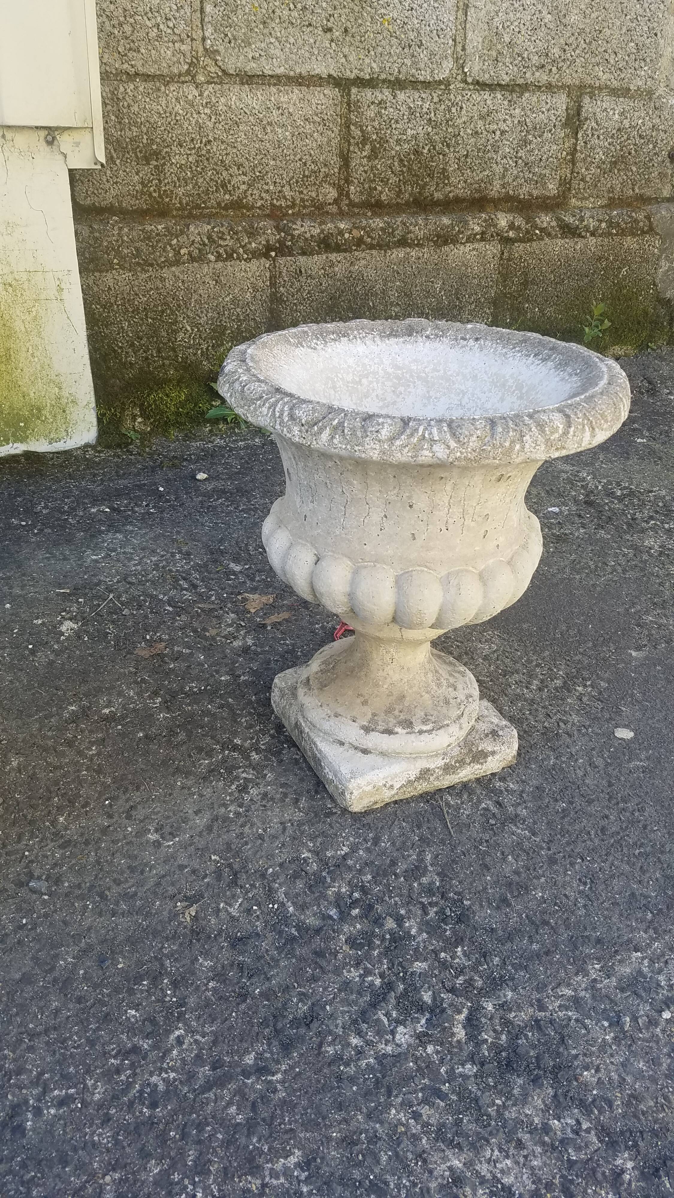 Pair of mediterranean vases in reconstructed stone