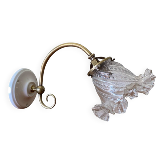 Swan neck wall light in brass, glass shade and porcelain rose.