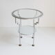Postmodern round glass  and steel side table, 1980s.