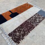 Handmade wool rug in colourful patterns, size 150x250 cm.