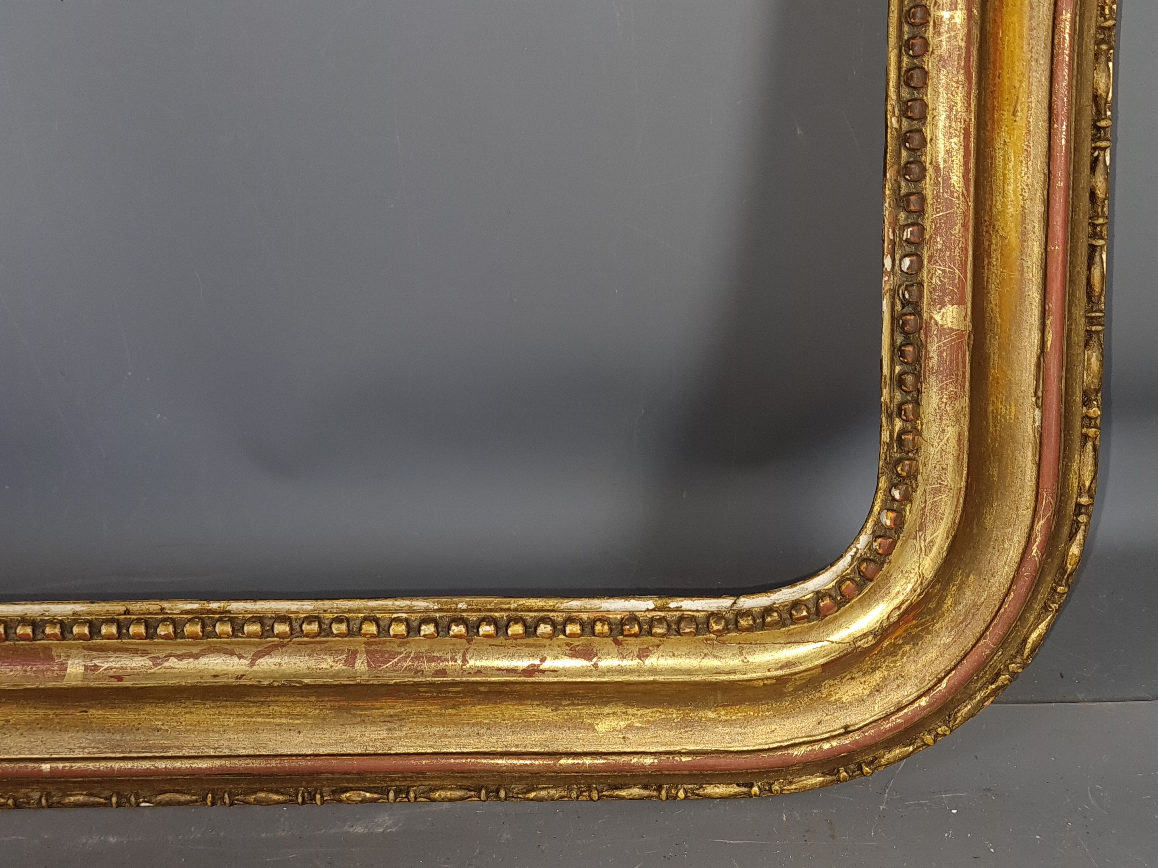 Old frame with doucine gilded stucco wood