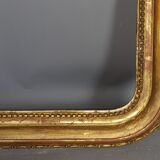 Old frame with doucine gilded stucco wood