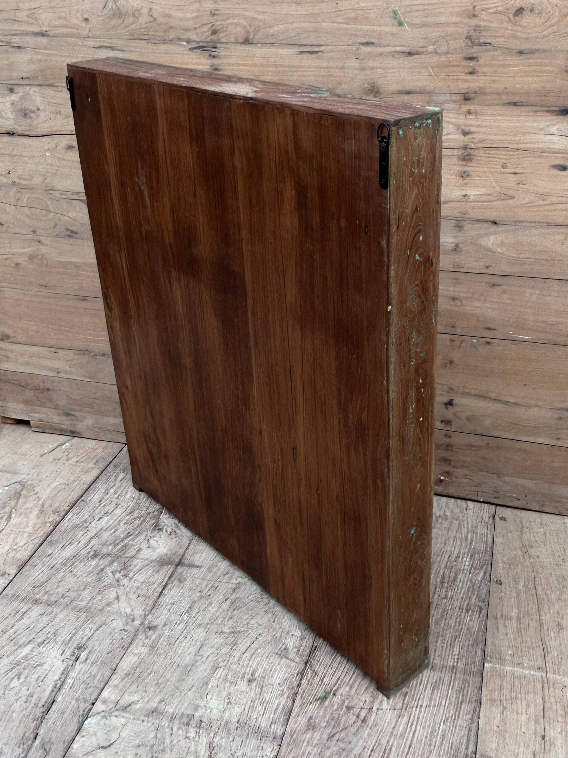 glass library in Burmese teak