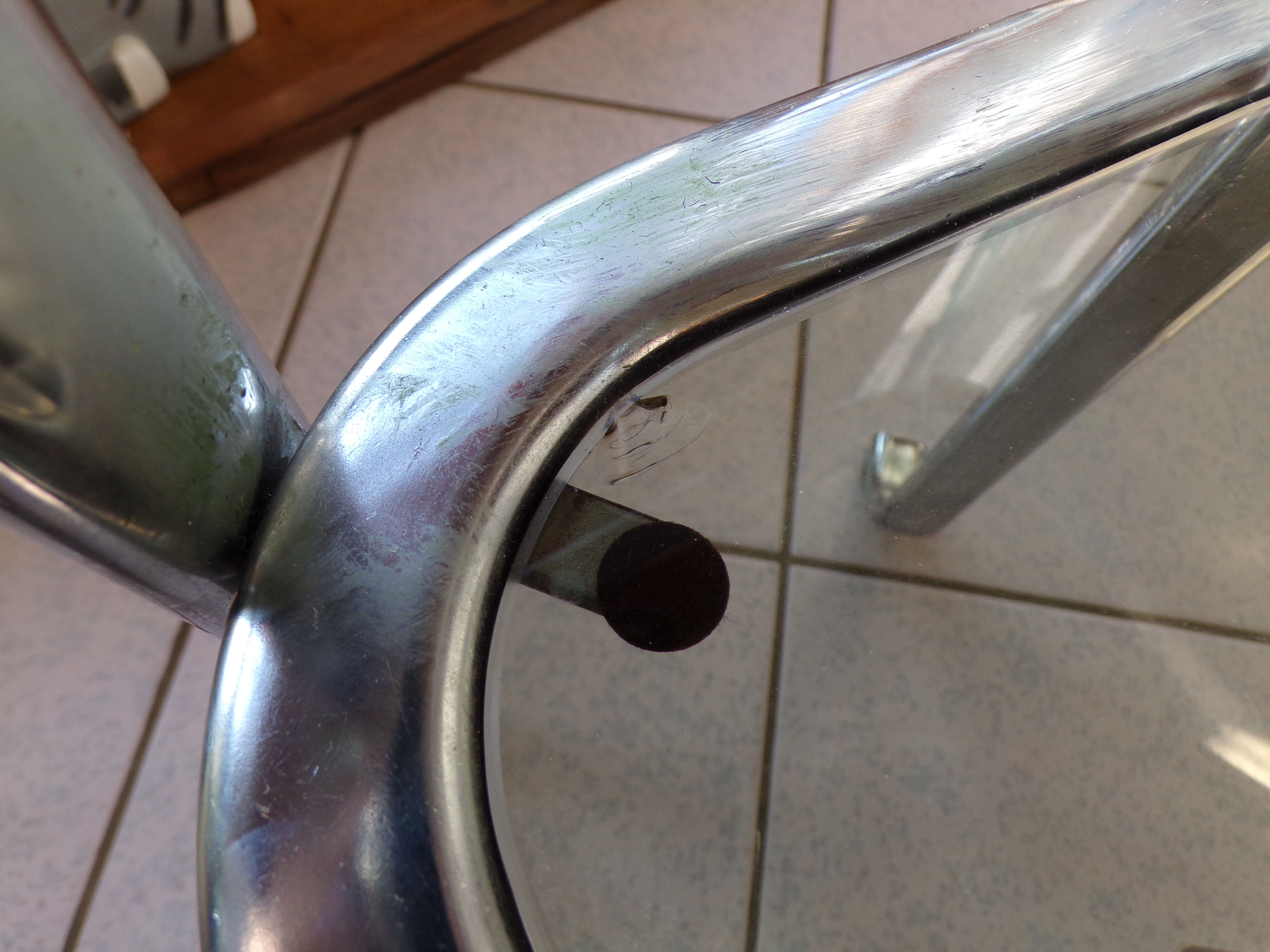 Bedside table or end of tubular steel sofa