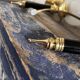Pair of brass and black torchiere wall lights