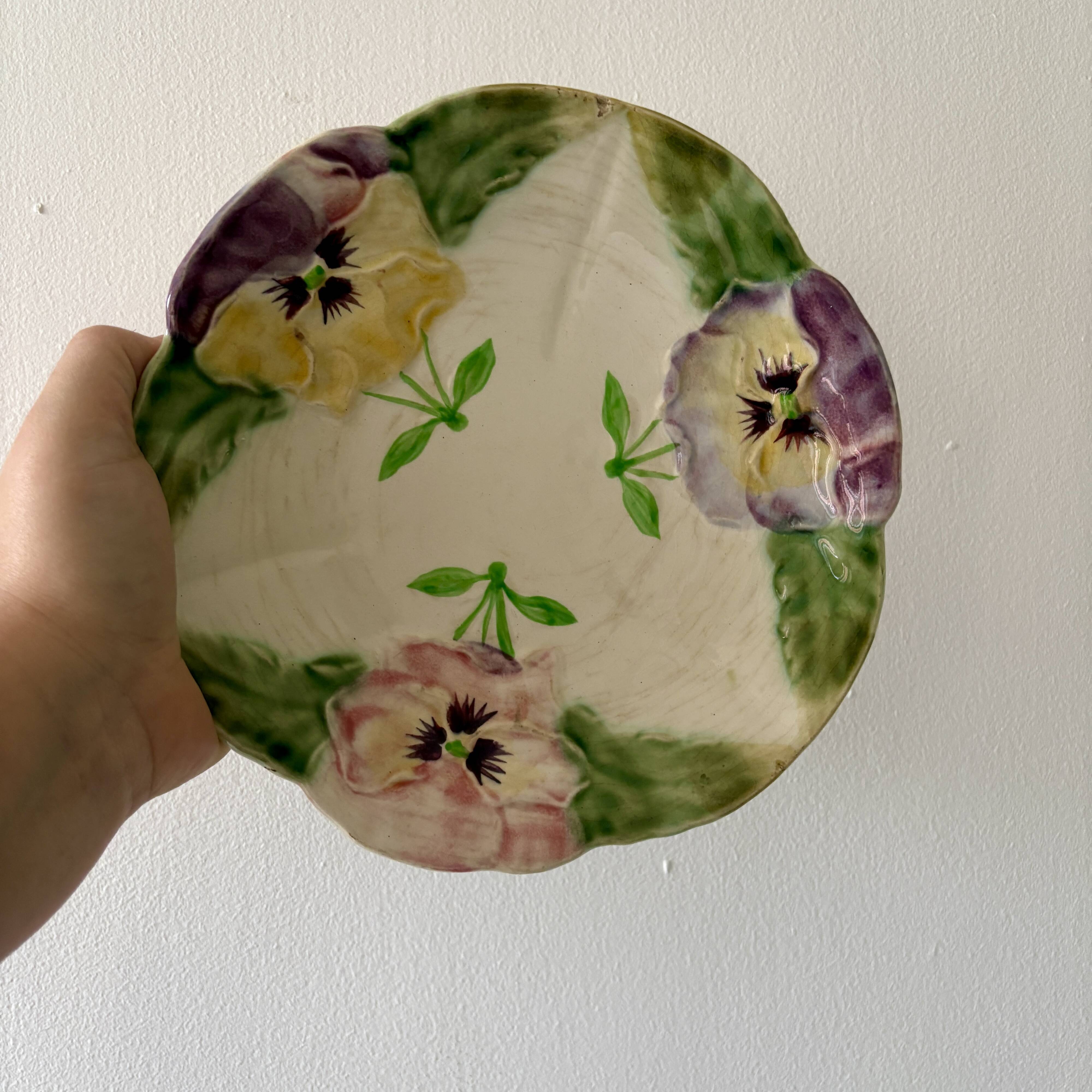 Set of 10 antique slip plates with flower decorations