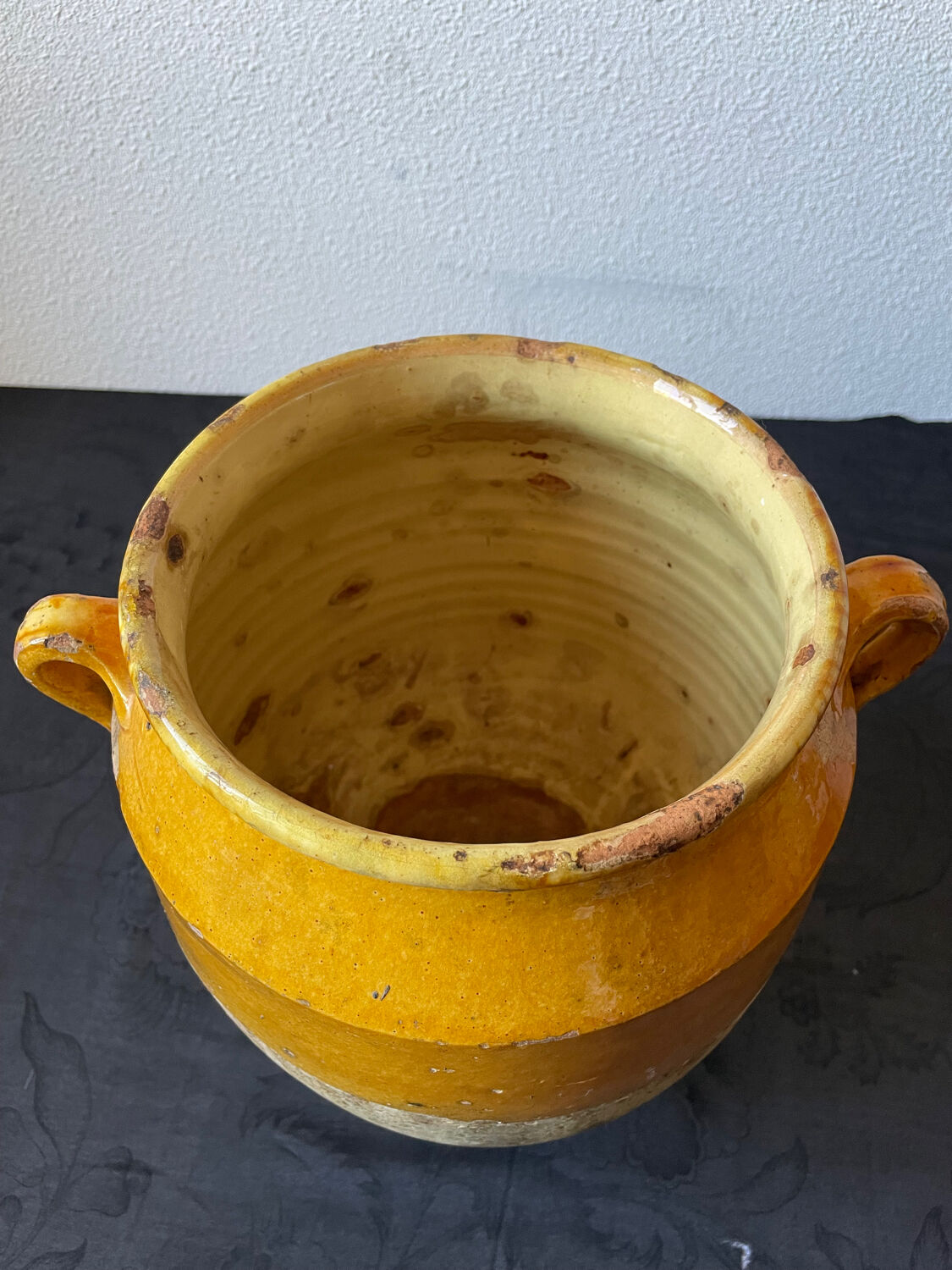 Old yellow glazed terracotta grease pot south west France