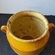 Old yellow glazed terracotta grease pot south west France
