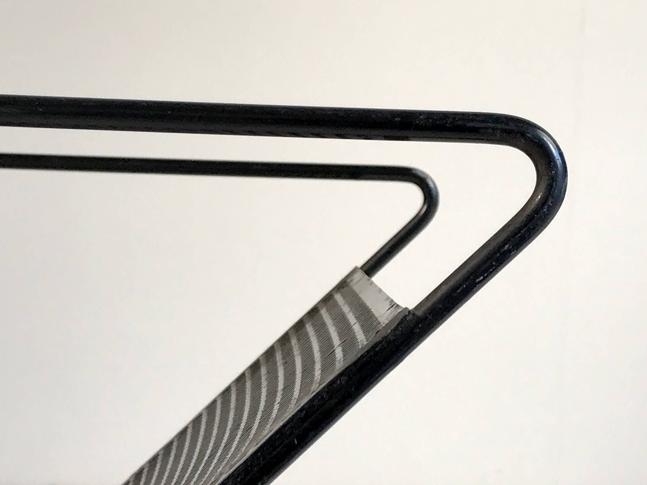 Perforated sheet metal magazine rack, 1960