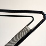 Perforated sheet metal magazine rack, 1960